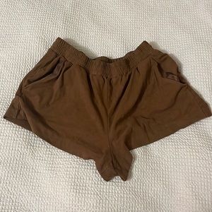 Fake brown suede shorts.